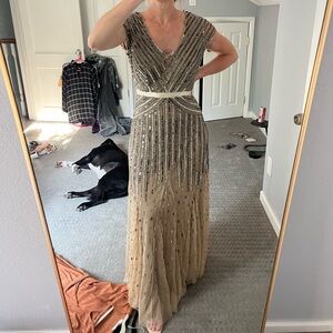 Beige/brown black tie wedding guest dress. Floor length. Black tie